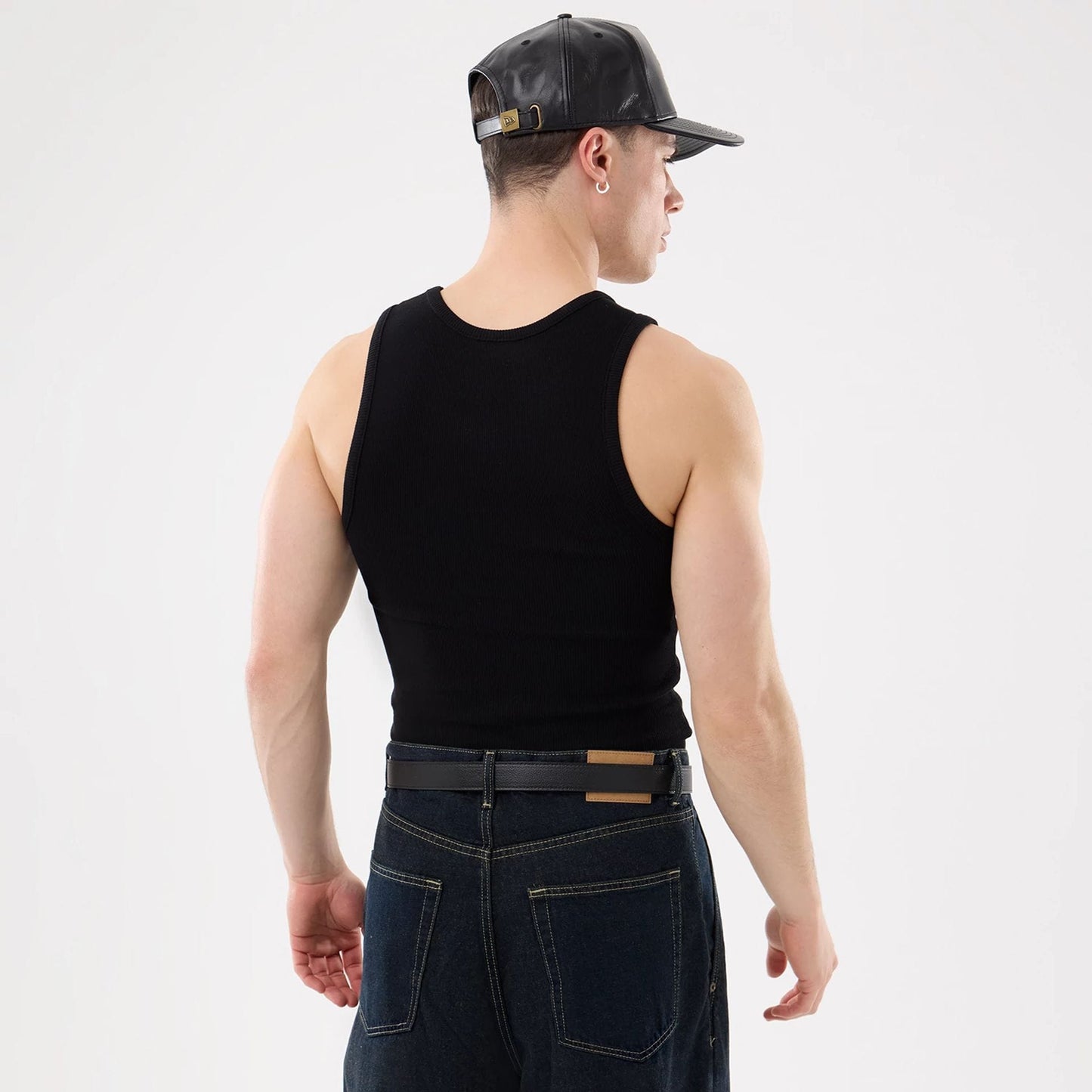 The model is wearing this MLB Rib New York Yankees Vest in black. 2