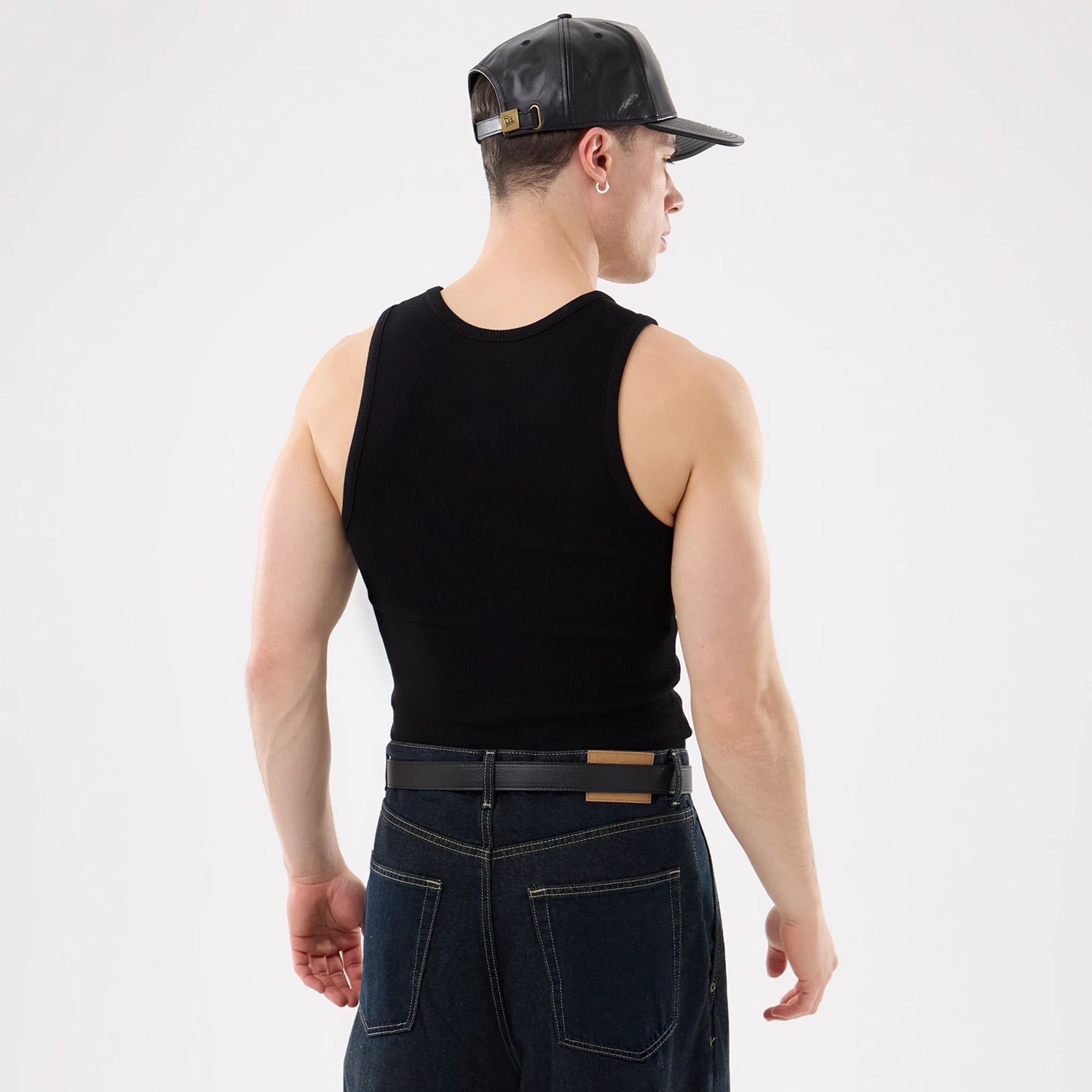 The model is wearing this MLB Rib New York Yankees Vest in black. 2