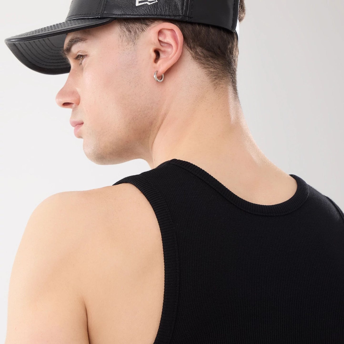 The model is wearing this MLB Rib New York Yankees Vest in black. 9