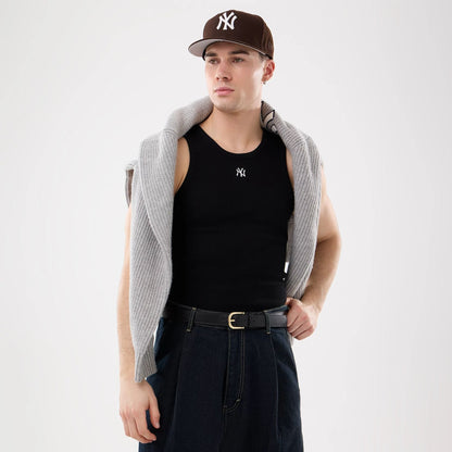 The model is wearing this MLB Rib New York Yankees Vest in black. 14