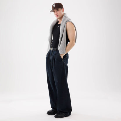 The model is wearing this MLB Rib New York Yankees Vest in black. 15