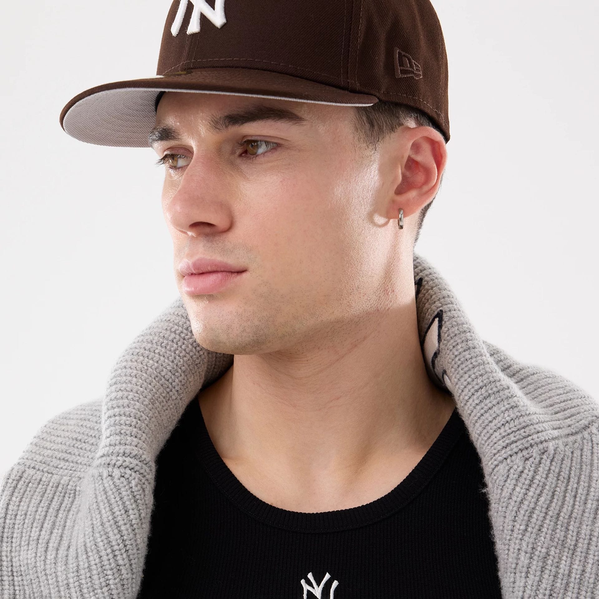 The model is wearing this MLB Rib New York Yankees Vest in black. 19
