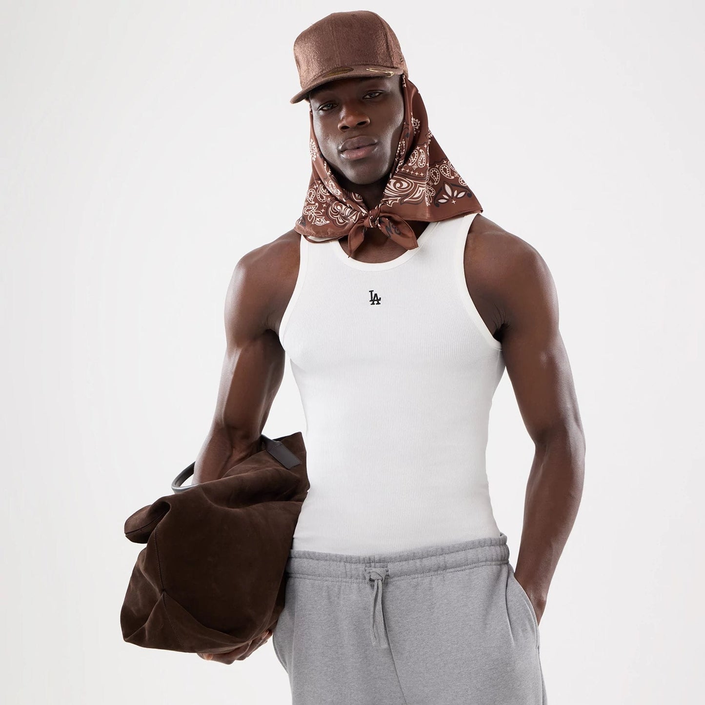 The model is wearing this MLB Rib LA Dodgers Vest in white. 3