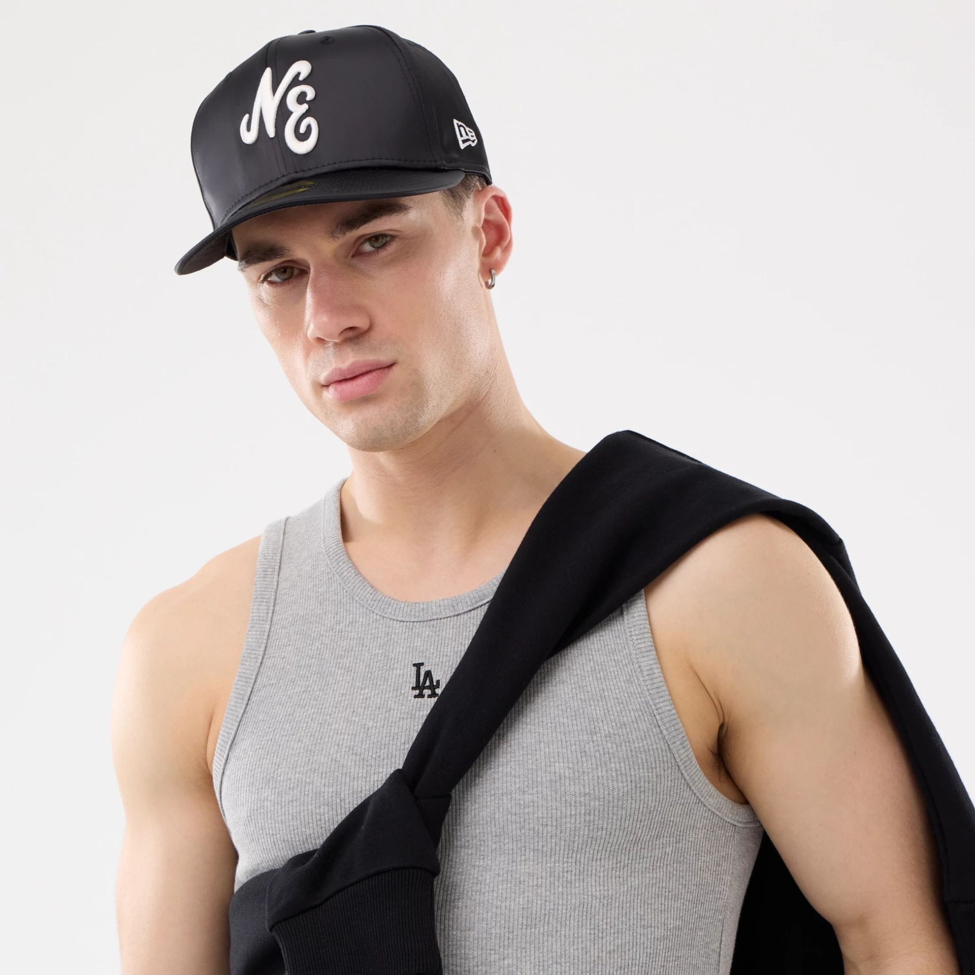 The model is wearing this MLB Rib LA Dodgers Vest in grey. 3