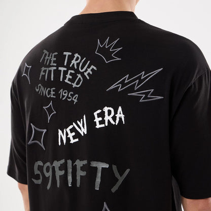 The model is wearing this New Era 59FIFTY Day Graphic T-Shirt in black. 5