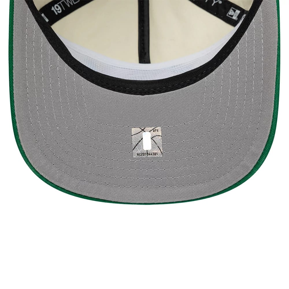 Pictured is this NBA Hardwood Classic Boston Celtics 19TWENTY Adjustable cap in cream. 2