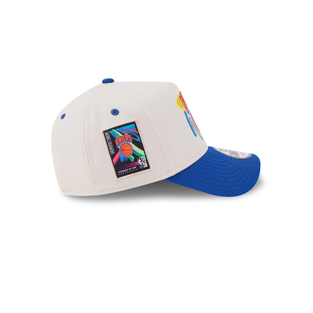 Pictured is this NBA Hardwood Classic New York Knicks 9FORTY A-Frame Adjustable cap in light beige. 5