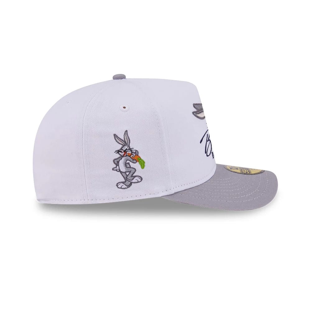Pictured is this Looney Tunes Bugs Bunny Script 59FIFTY A-Frame Fitted cap in white & grey. 5