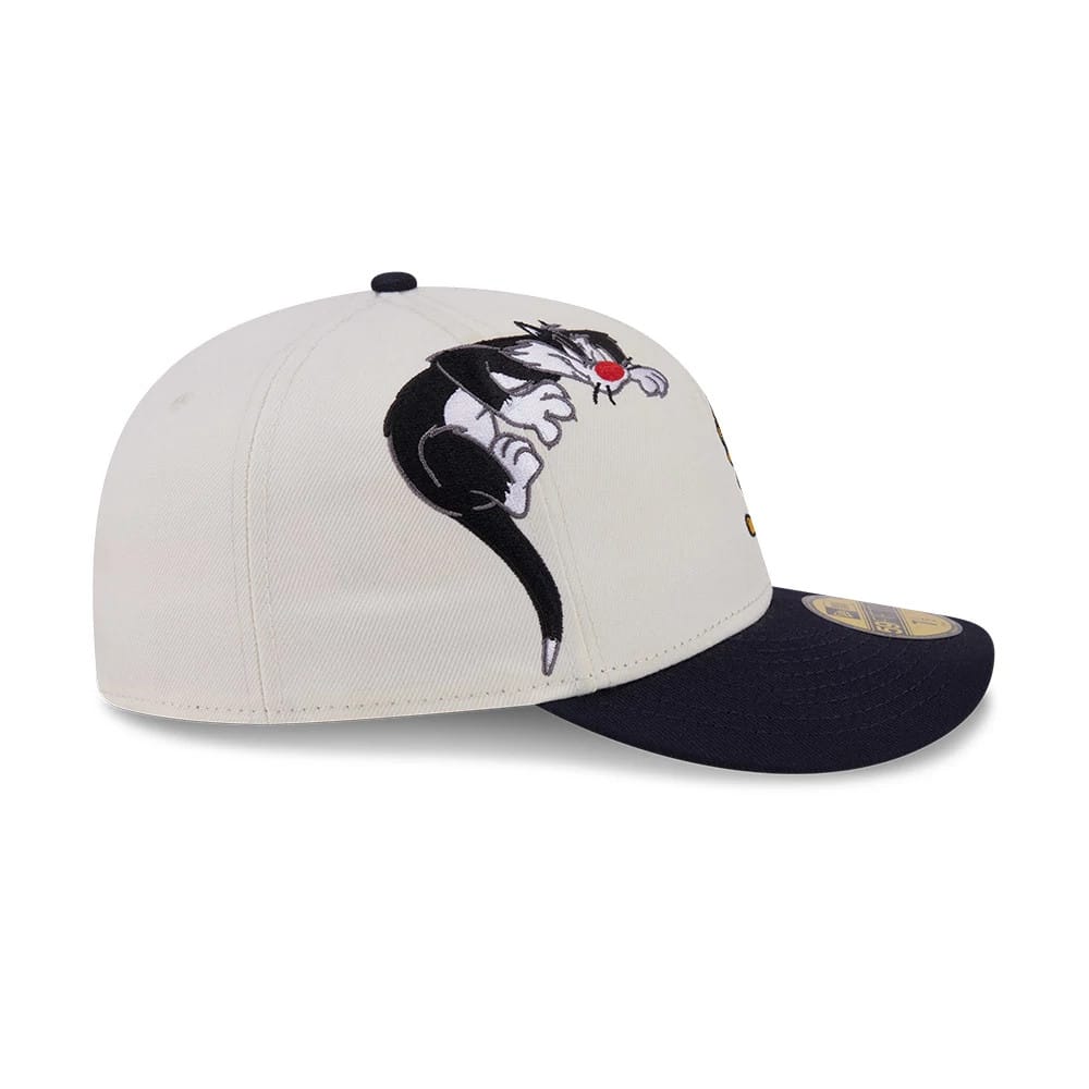 Pictured is this Looney Tunes Pwetty Cat Multi Character 59FIFTY Fitted cap in navy. 5