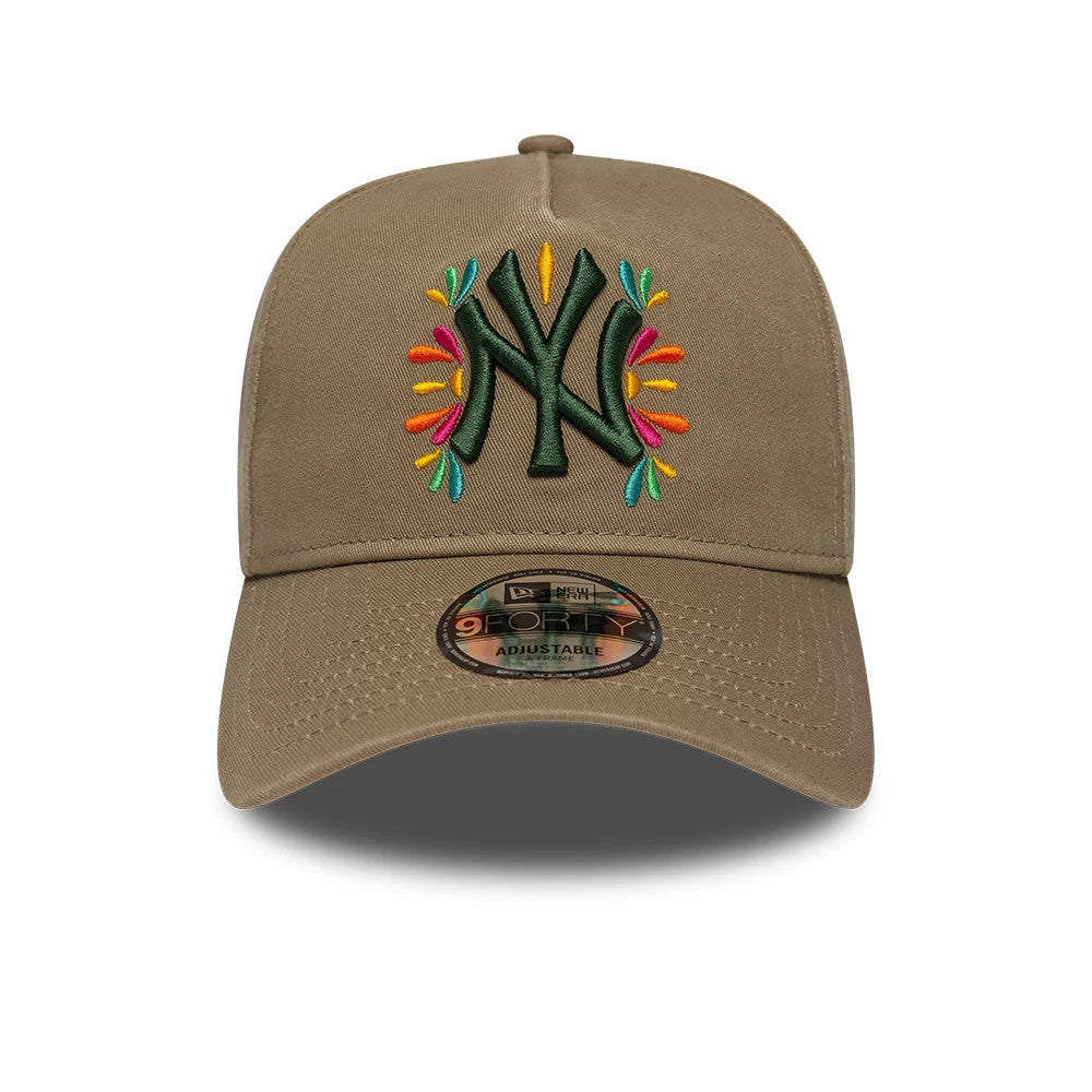 New York Yankees MLB Vibrant Festivities Beige New Era 9FORTY A-Frame Adjustable Cap, front view showing multicolour embroidered NY logo with festive motifs on the structured beige crown, and a 9FORTY size sticker on the beige curved visor.