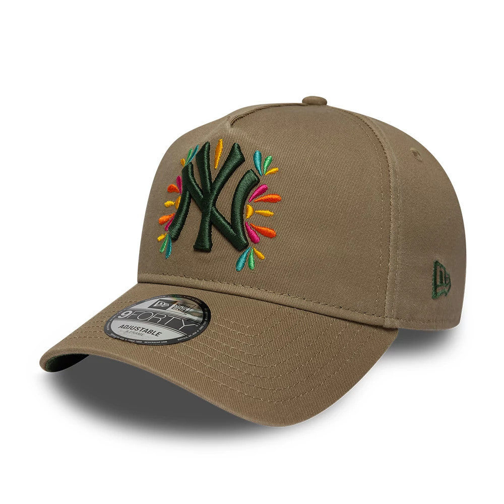 New York Yankees MLB Vibrant Festivities Beige New Era 9FORTY A-Frame Adjustable Cap, three-quarter view showing the multicoloured embroidery around the raised green NY logo on the front panel, with a 9FORTY size sticker on the curved beige visor.