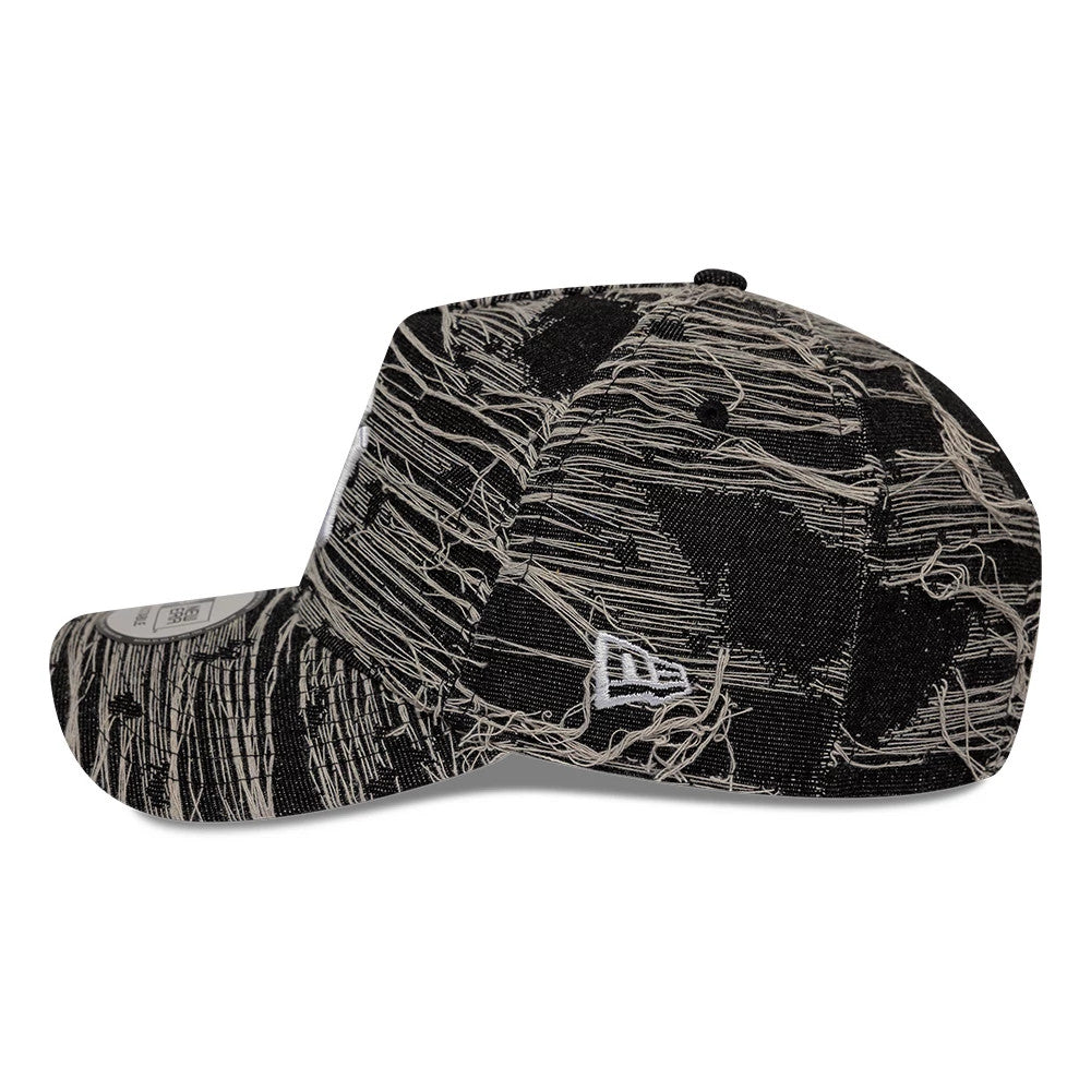 Pictured is this MLB Distressed Denim New York Yankees 9FORTY E-Frame Adjustable cap in black. 5