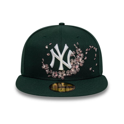 Pictured is this MLB Cherry Blossom New York Yankees 59FIFTY Fitted cap in dark green. 3