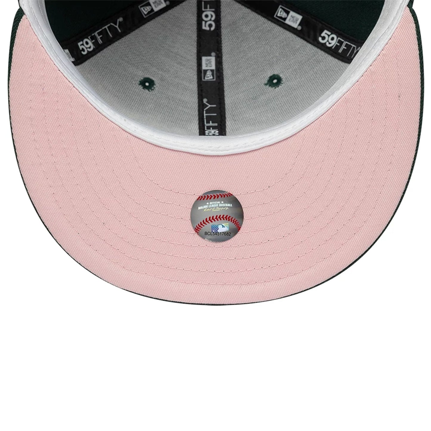 Pictured is this MLB Cherry Blossom New York Yankees 59FIFTY Fitted cap in dark green. 2