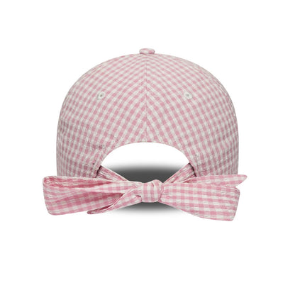 Pictured is this New Era Gingham Bowback 9TWENTY Adjustable cap in pastel pink. 2