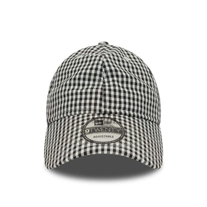Pictured is this New Era Gingham Bowback 9TWENTY Adjustable cap in black. 3
