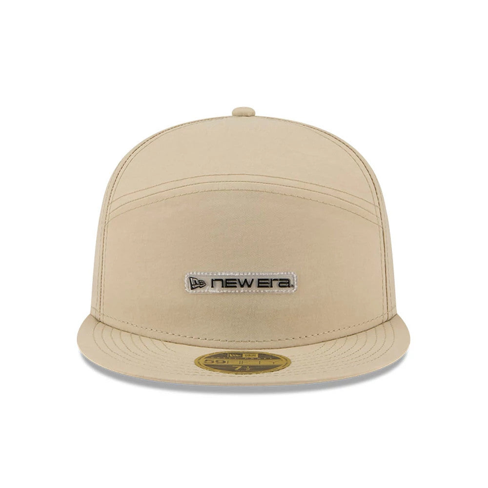 New Era 59FIFTY Day Cream Split Panel 59FIFTY Fitted Cap, front view showing the cream-coloured embroidered New Era logo on the front panel, with a flat cream visor and a gold 59FIFTY size sticker at the centre of the visor.