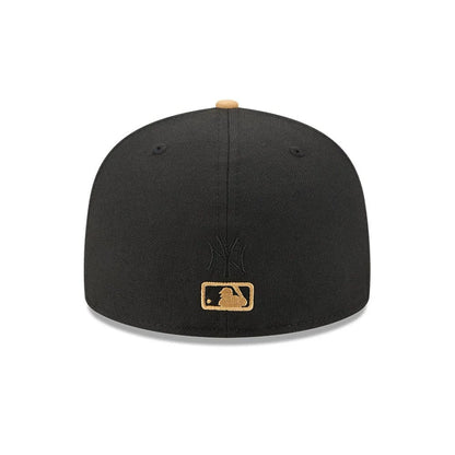 Pictured is this MLB 59FIFTY Day Fauna New York Yankees 59FIFTY Fitted cap in black. 7