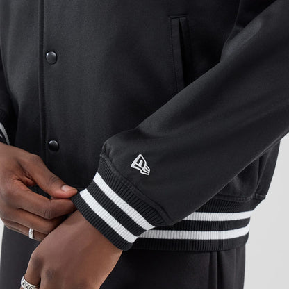 The model is wearing this MLB Jersey Bomber Detroit Tigers Jacket in black. 5