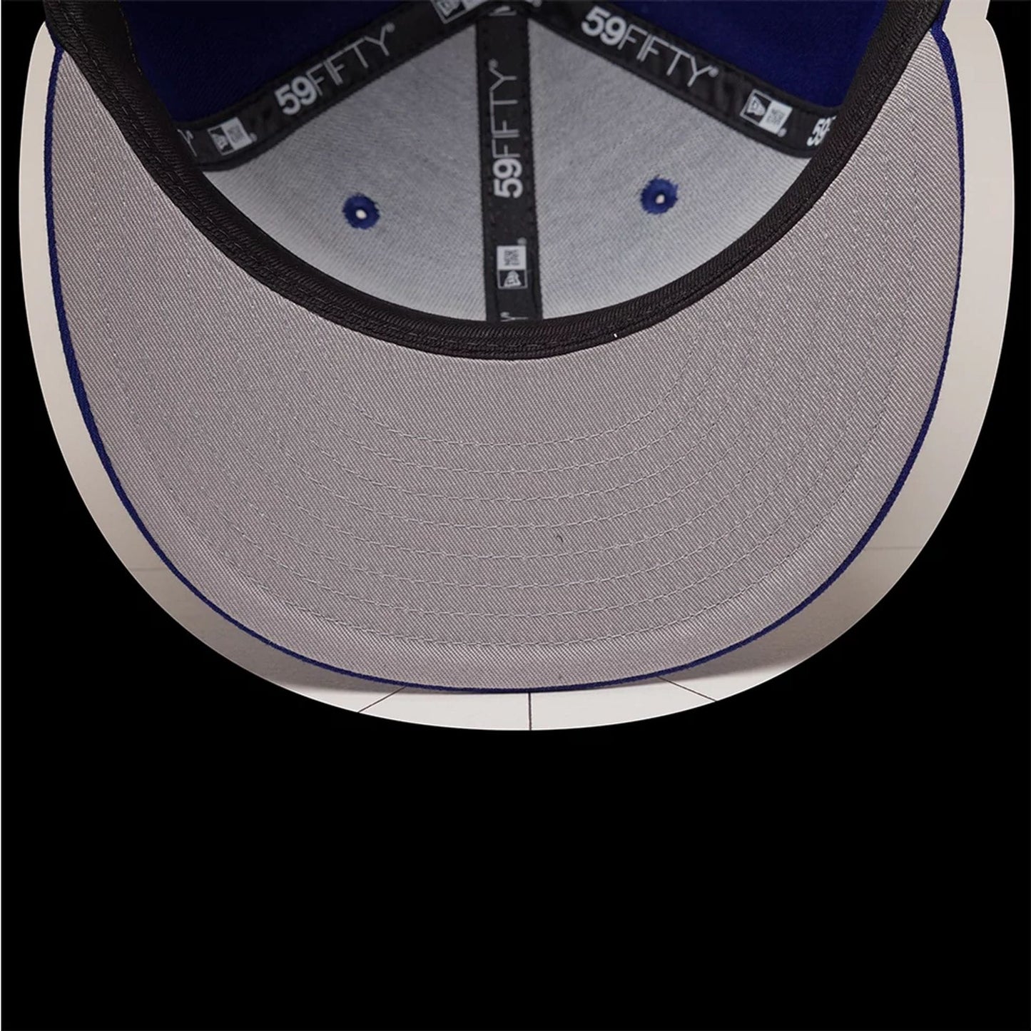 Pictured is this MLB Emblem LA Dodgers 59FIFTY Fitted cap in dark blue. 2