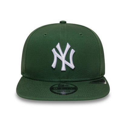 Pictured is this MLB League Essential New York Yankees 9FIFTY Snapback cap in dark green. 2