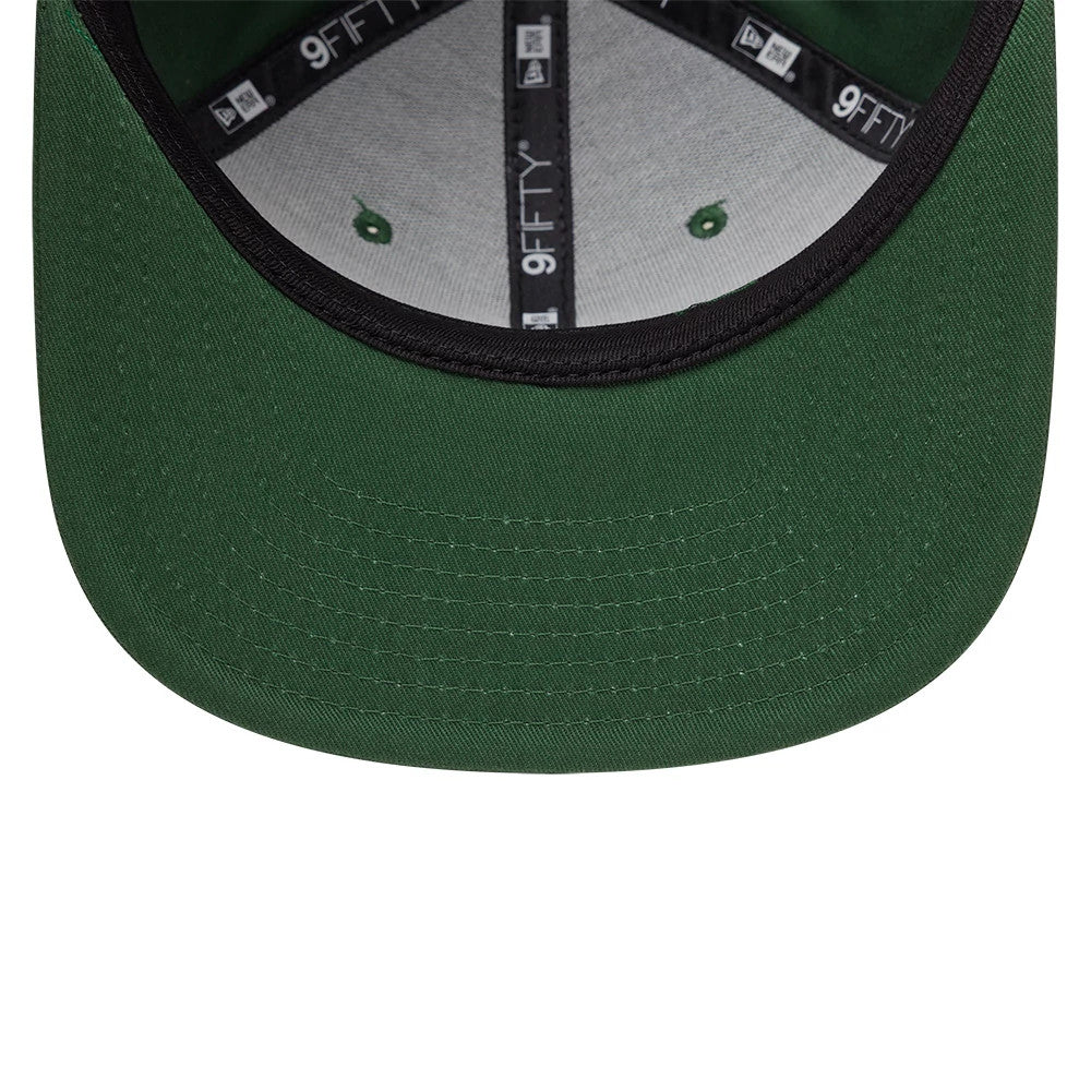 Pictured is this MLB League Essential New York Yankees 9FIFTY Snapback cap in dark green. 5
