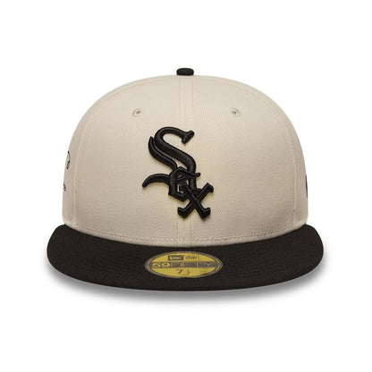 Pictured is this MLB Side Script Chicago White Sox 59FIFTY Fitted cap in cream & navy. 2