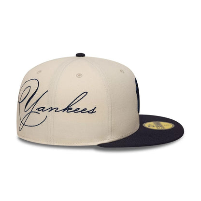 Pictured is this MLB Side Script New York Yankees 59FIFTY Fitted cap in Cream. 3