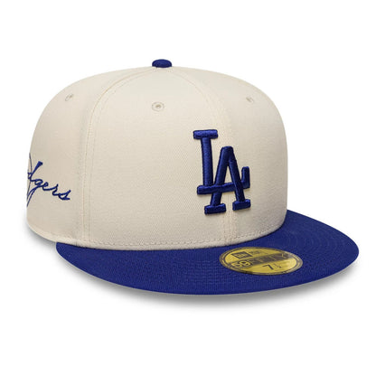 Pictured is this MLB Side Script LA Dodgers 59FIFTY Fitted cap in cream & blue. 1