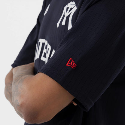 The model is wearing this LMB Sultanes De Monterrey Oversized T-Shirt in navy. 5