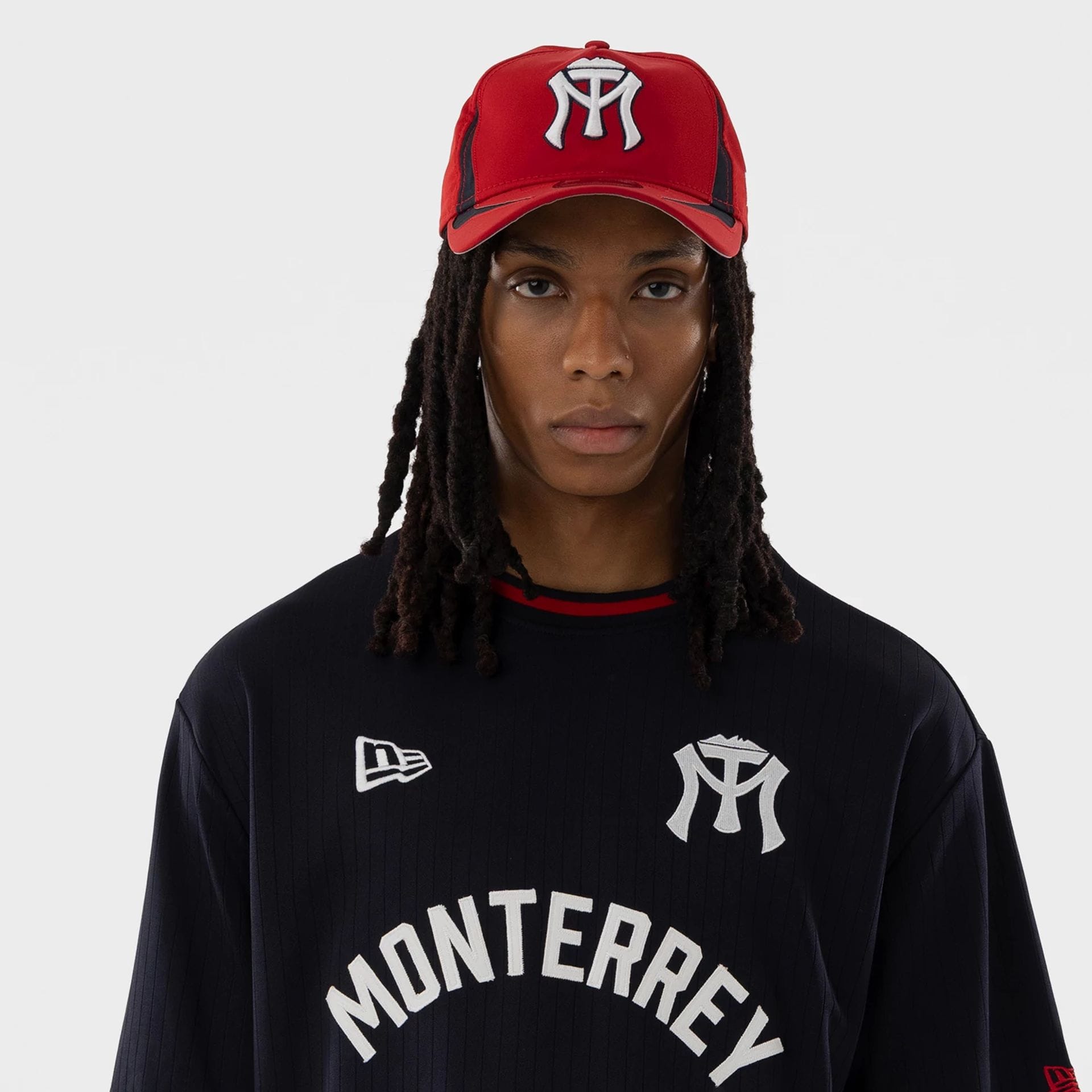 The model is wearing this LMB Sultanes De Monterrey T-Shirt in navy. 3