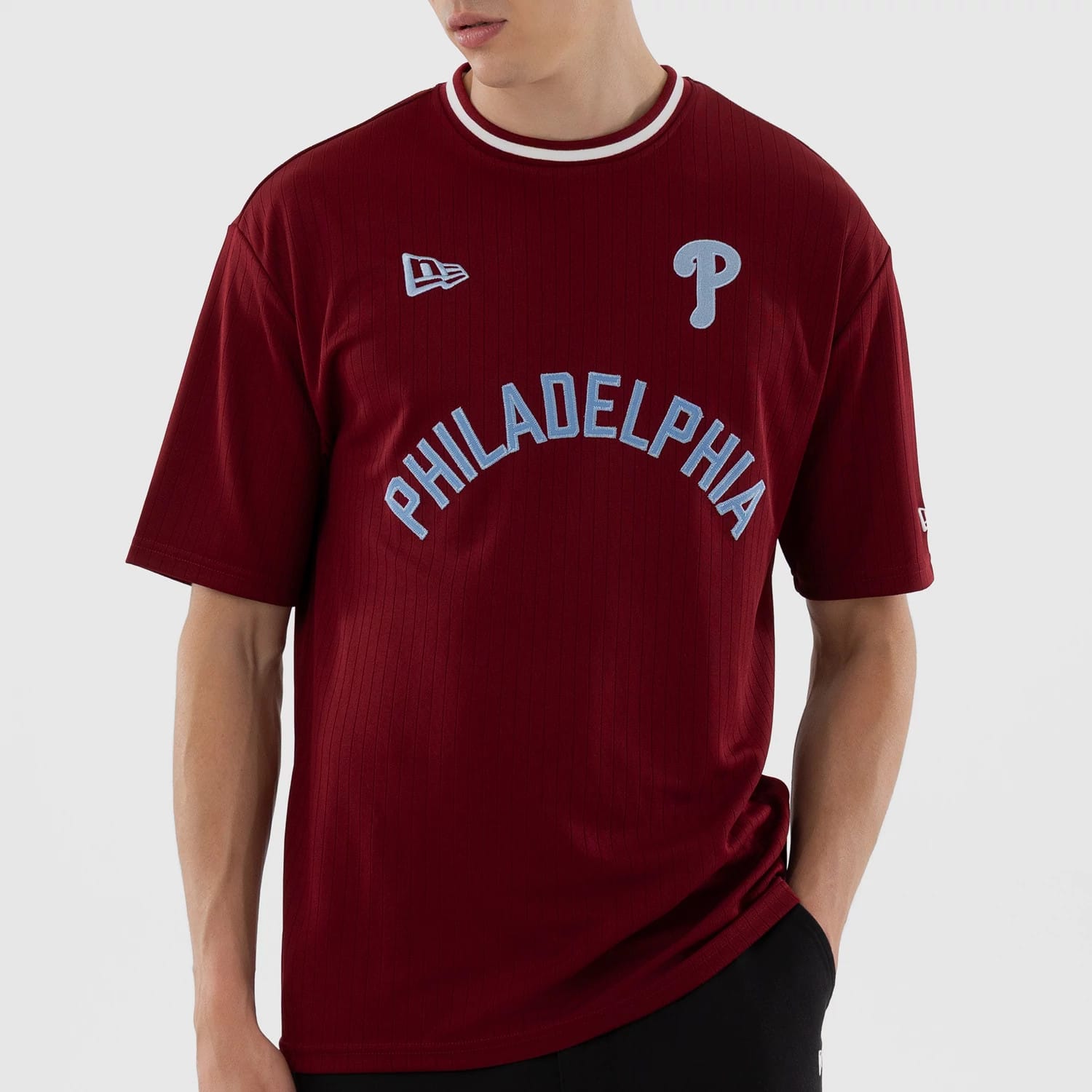 The model is wearing this MLB Philadelphia Phillies Oversized T-Shirt in dark red. 5