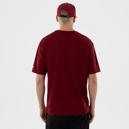 The model is wearing this MLB Philadelphia Phillies Oversized T-Shirt in dark red. 2