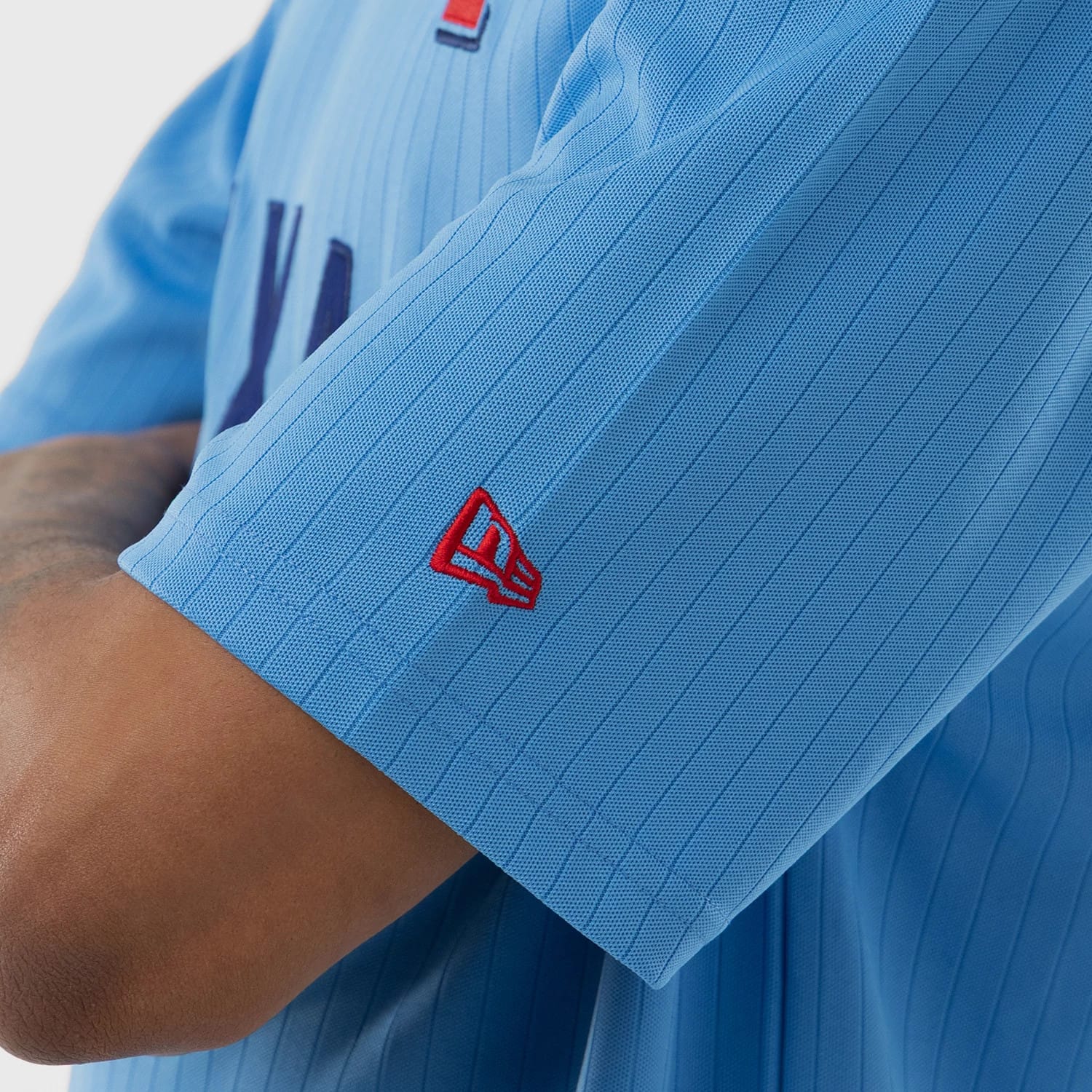 The model is wearing this MLB Texas Rangers Oversized T-Shirt in pastel blue. 5