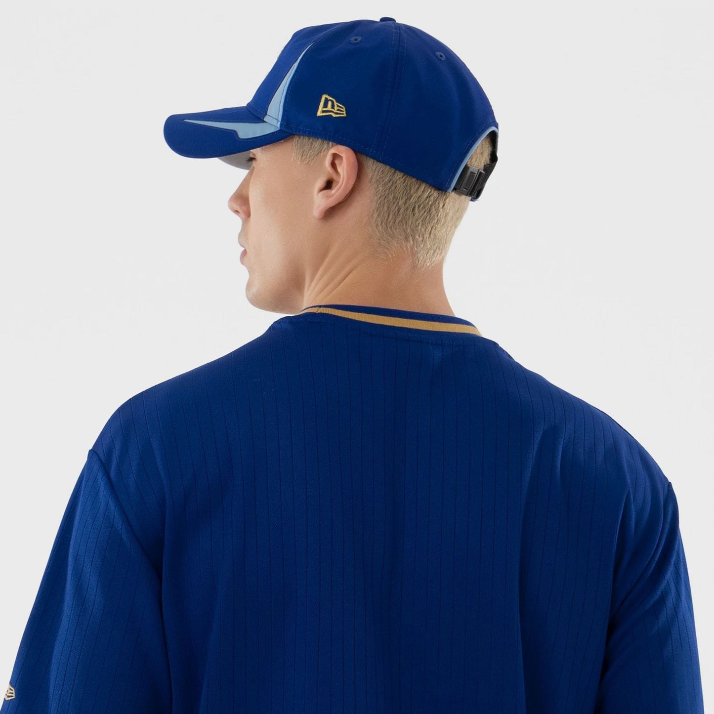 The model is wearing this MLB Kansas City Royals T-Shirt in blue. 7