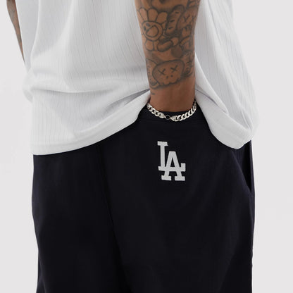 The model is wearing this MLB LA Dodgers Chino Trousers in navy. 4