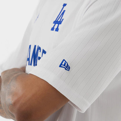 The model is wearing this MLB LA Dodgers Oversized T-Shirt in white. 5