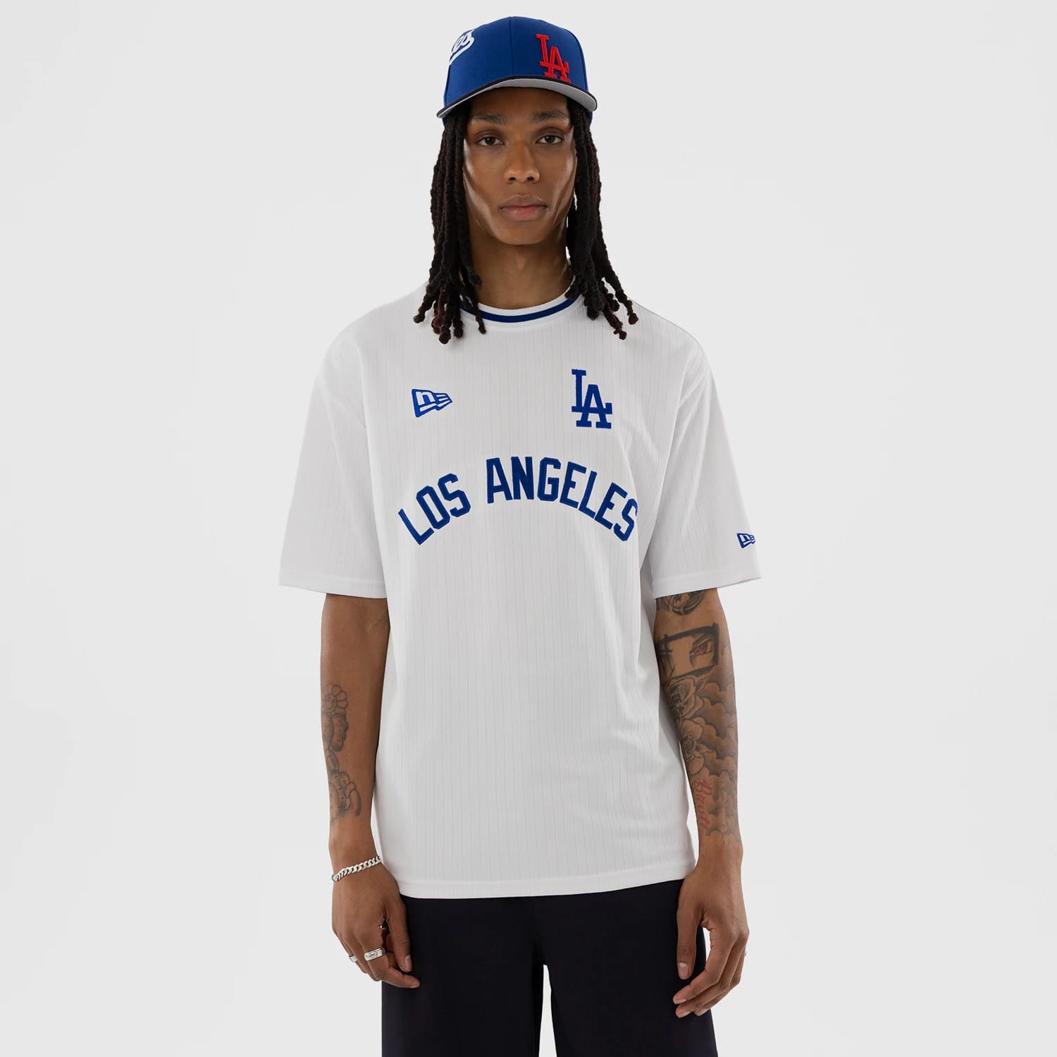 The model is wearing this MLB LA Dodgers Oversized T-Shirt in white. 1