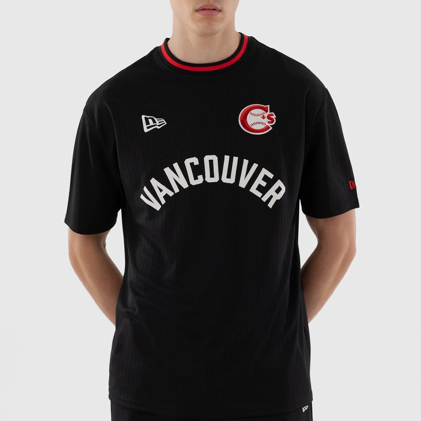 The model is wearing this MiLB Vancouver Canadians Oversized T-Shirt in black. 3