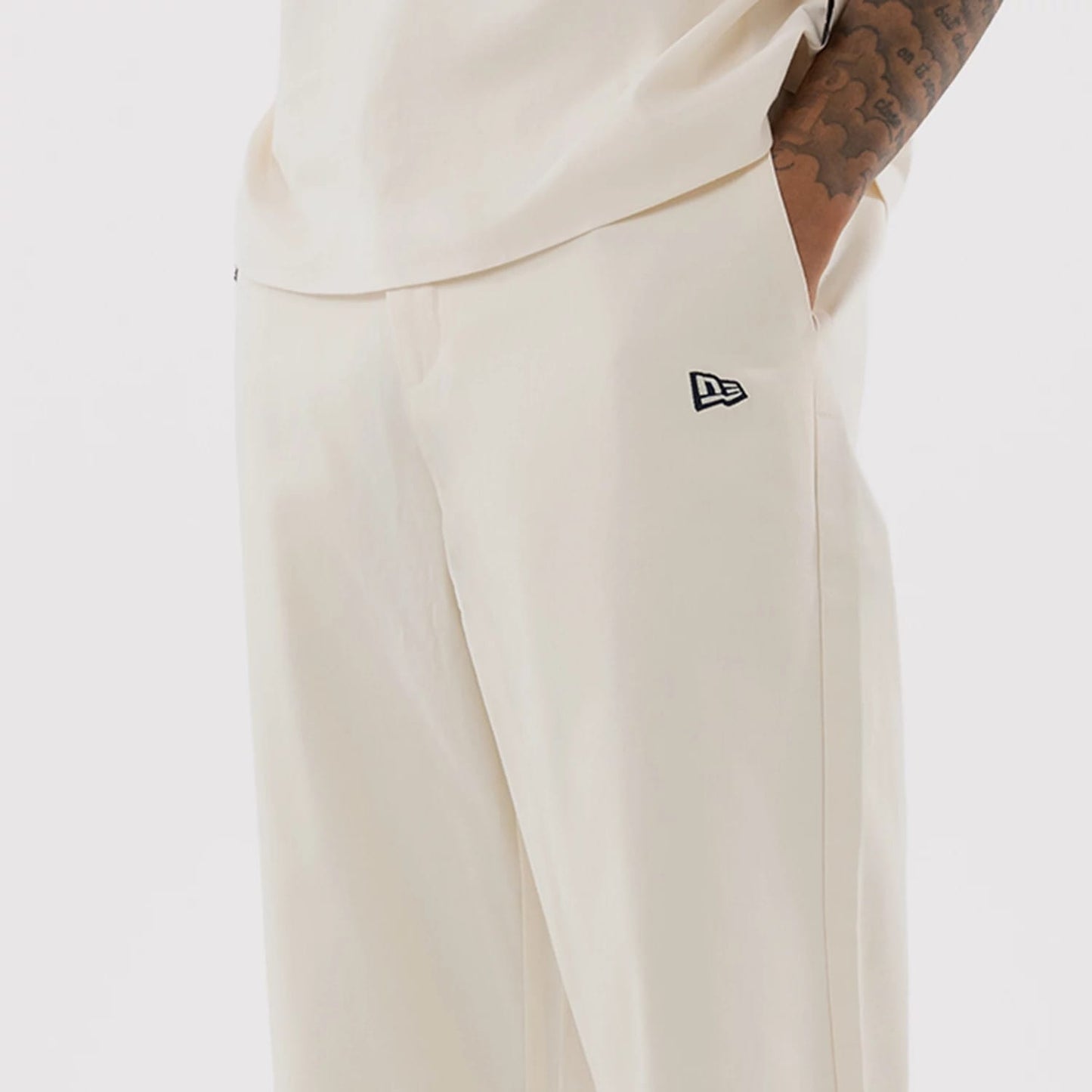 The model is wearing this MLB New York Yankees Chino Trousers in Cream. 5