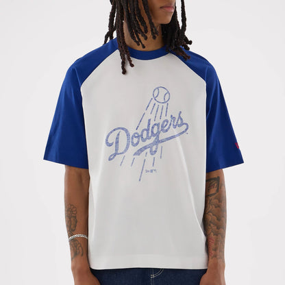 The model is wearing this MLB LA Dodgers Boxy T-Shirt in white. 5