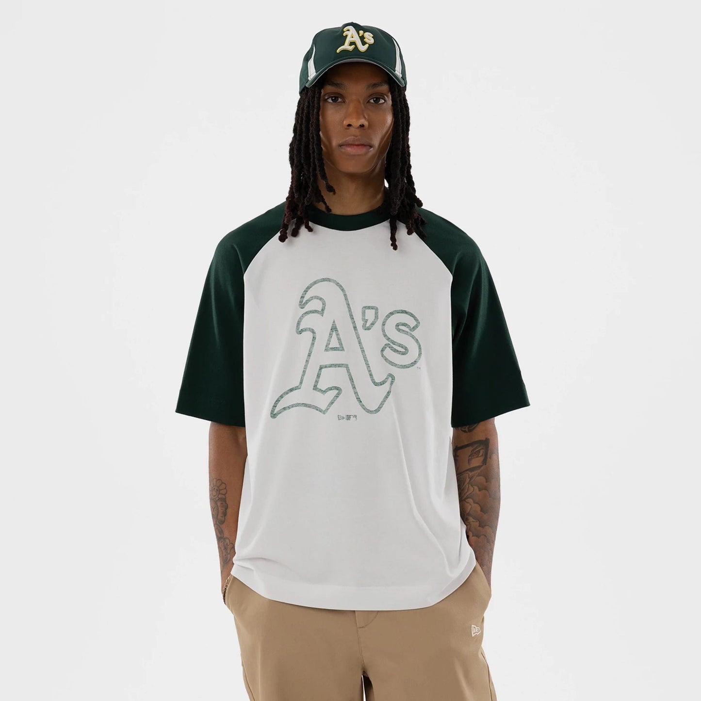 The model is wearing this MLB Athletics Boxy T-Shirt in white. 1