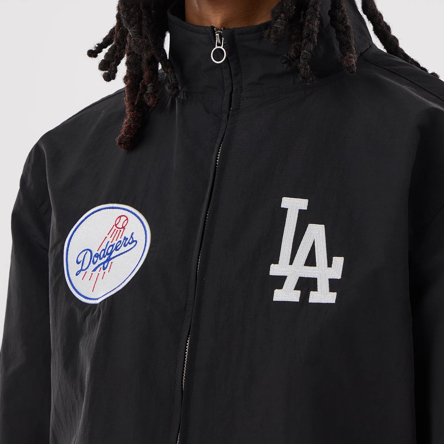 The model is wearing this MLB LA Dodgers Sports Jacket in black. 4