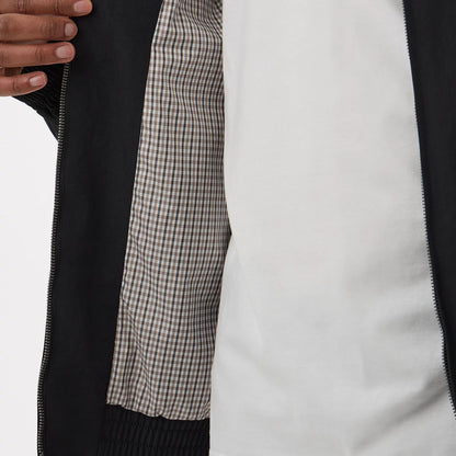 The model is wearing this MLB LA Dodgers Sports Jacket in black. 3