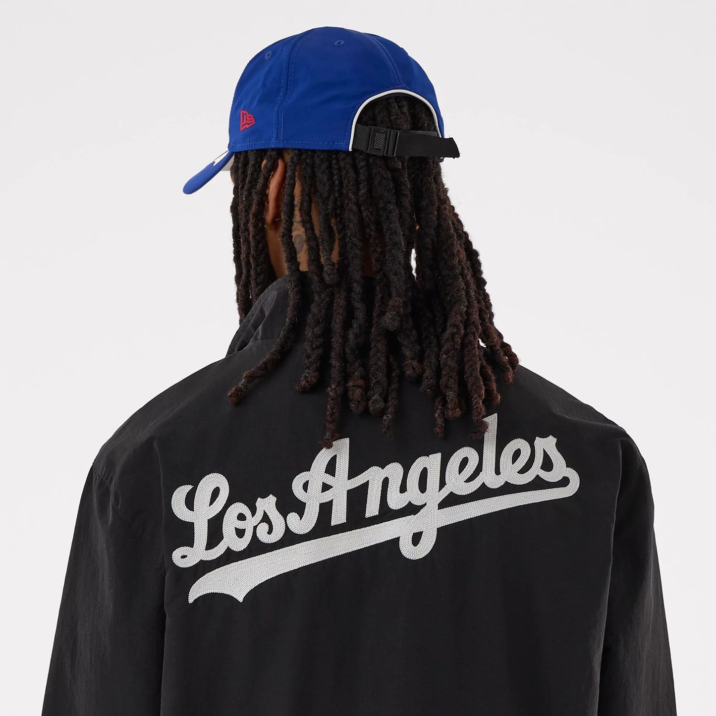 The model is wearing this MLB LA Dodgers Sports Jacket in black. 5