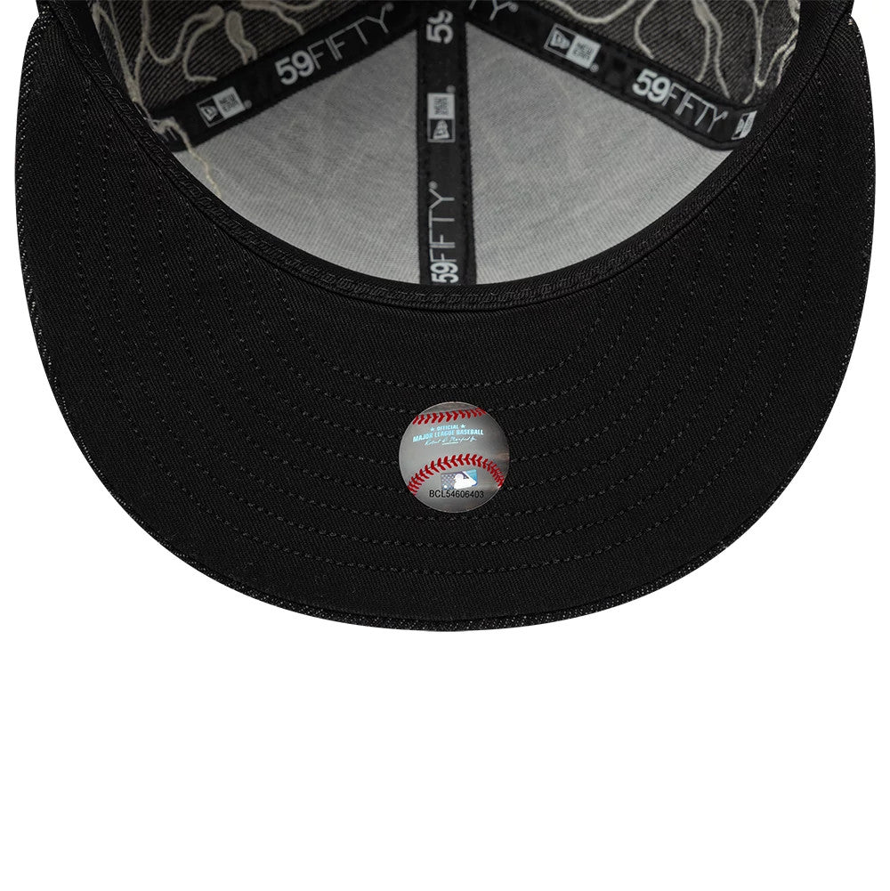 Chicago White Sox MLB Floral Denim Black New Era 59FIFTY Fitted Cap, inside view showing the floral pattern on the panels, the black undervisor with a baseball-shaped authenticity sticker, and the black sweatband with 59FIFTY taping.