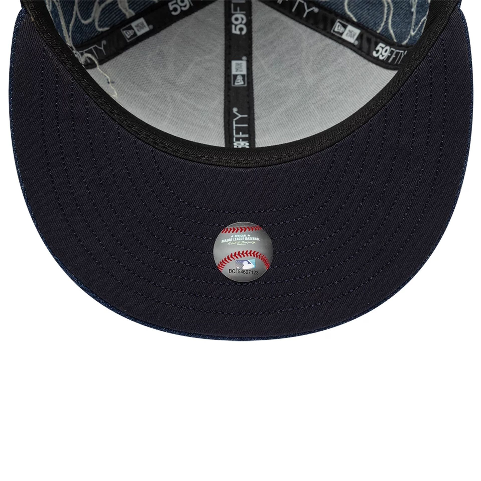 Pictured is this MLB Floral Denim LA Dodgers 59FIFTY Fitted cap in blue. 7