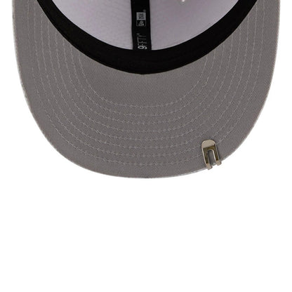 Pictured is this New Era Golf 9FIFTY Snapback cap in white. 2