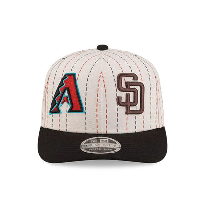 Pictured is this MLB Mexico City Series 2026 MLB Dueling League Logos 9SEVENTY Stretch Snap Adjustable cap in light beige. 3