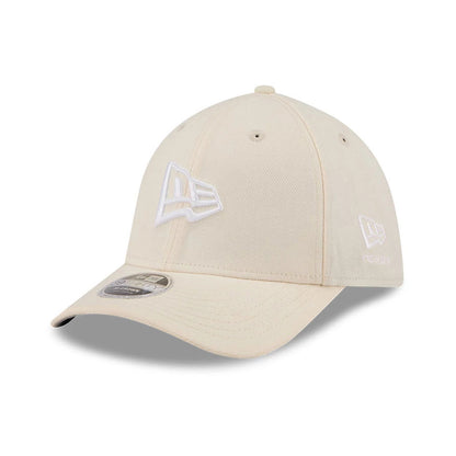 Pictured is this New Era Flag 39THIRTY M-Crown Stretch Fit cap in light beige. 1